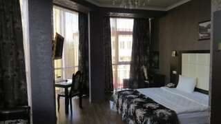 Гостиница Verona Hotel Ессентуки Номер люкс с 1 двуспальной кроватью-2